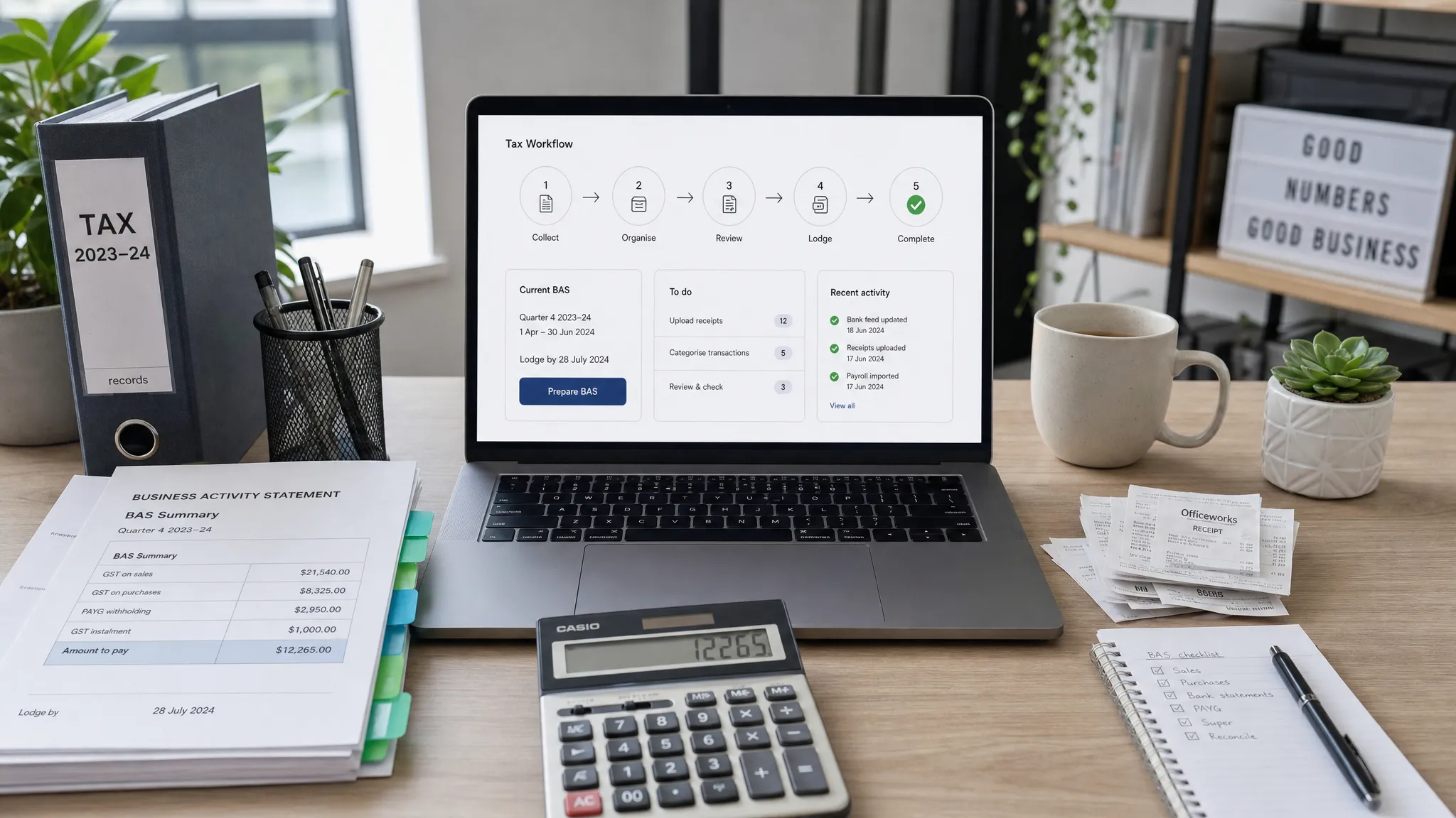 A modern Australian accounting workspace with organised tax documents, BAS summaries, receipts, a calculator, and a laptop facing the camera on a desk with a simple tax workflow dashboard on the screen.